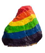 Rock painted in rainbow stripes