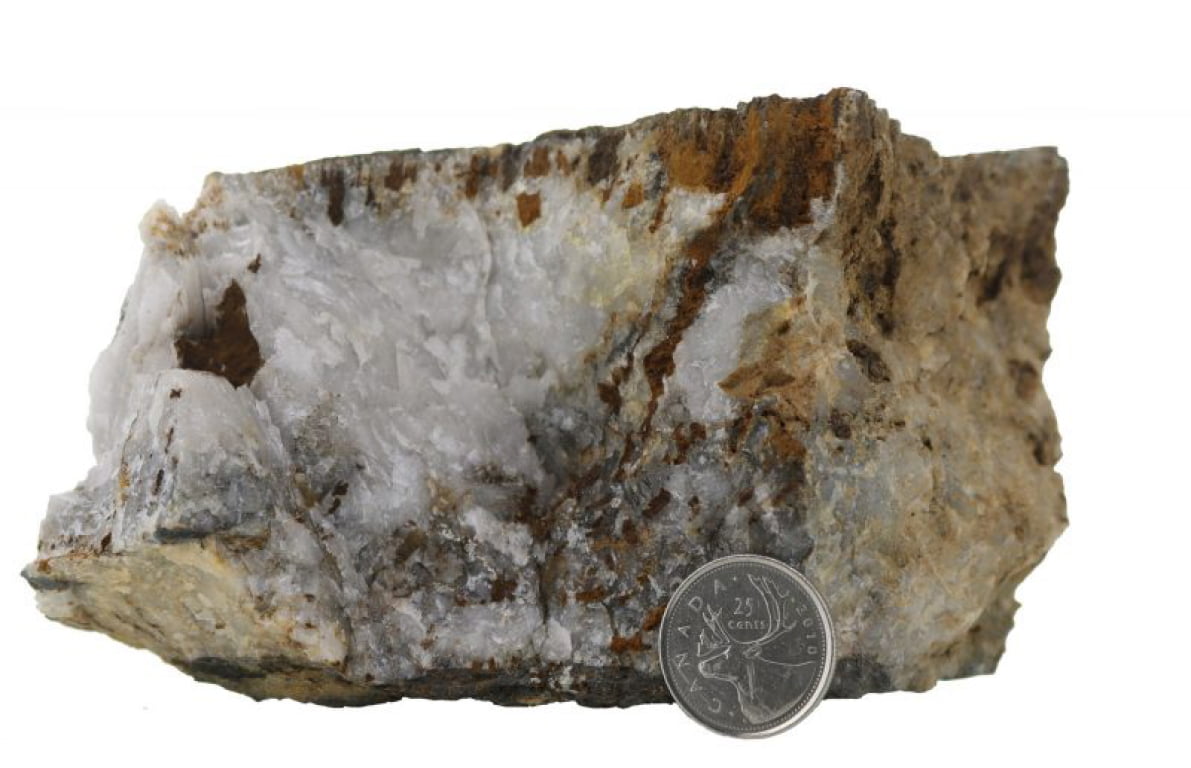 Barite-Quartz-Magnetite vein with hematized wall rock, boiling textures and oxidized suphides within the vein. This sample was hosted in Nicol Creek Basalts.